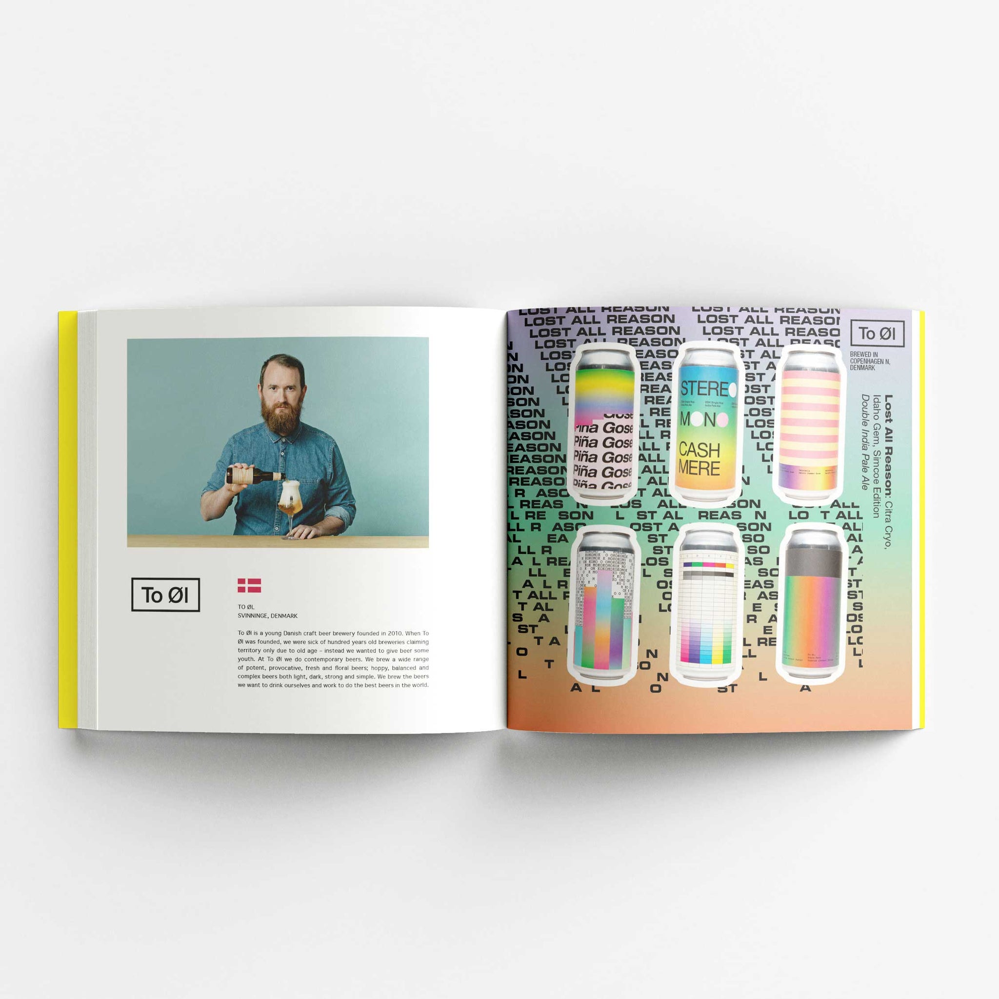 An open book displaying a two-page spread. The left page features a photo of a bearded man in a blue shirt holding a beer can and a glass of beer, with text about the brewery To Øl from Denmark. The right page showcases various To Øl beer cans with minimalist designs, featuring horizontal stripes in pastel colors and text labels. The background of the right page includes the repeated text "LOST ALL REASON" in a gradient color scheme.