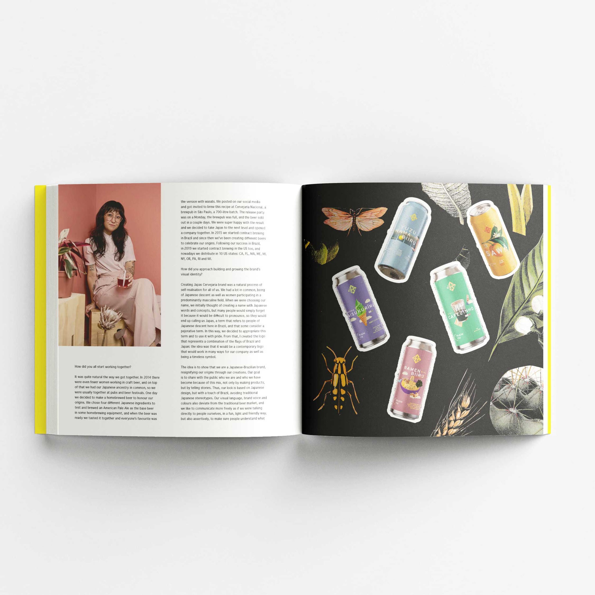 An open book displaying a two-page spread. The left page features a photo of a woman sitting with a drink, accompanied by text about her and her brewery, named Japas Cervejaria. The right page showcases various Japas Cervejaria Brewery beer cans with colorful labels, set against a dark background with illustrations of insects, leaves, and a butterfly. The can designs are vibrant and visually appealing, emphasizing the natural theme.