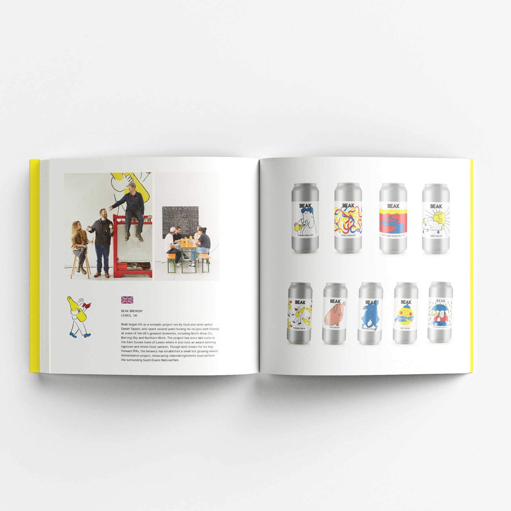 An open book displaying a two-page spread. The left page features photos of people interacting and working in a creative environment, accompanied by text about Beak Brewery from the UK. The right page showcases various Beak Brewery beer cans with minimalist, colorful illustrations. The designs include abstract patterns and playful characters, with each can displaying a unique artwork.
